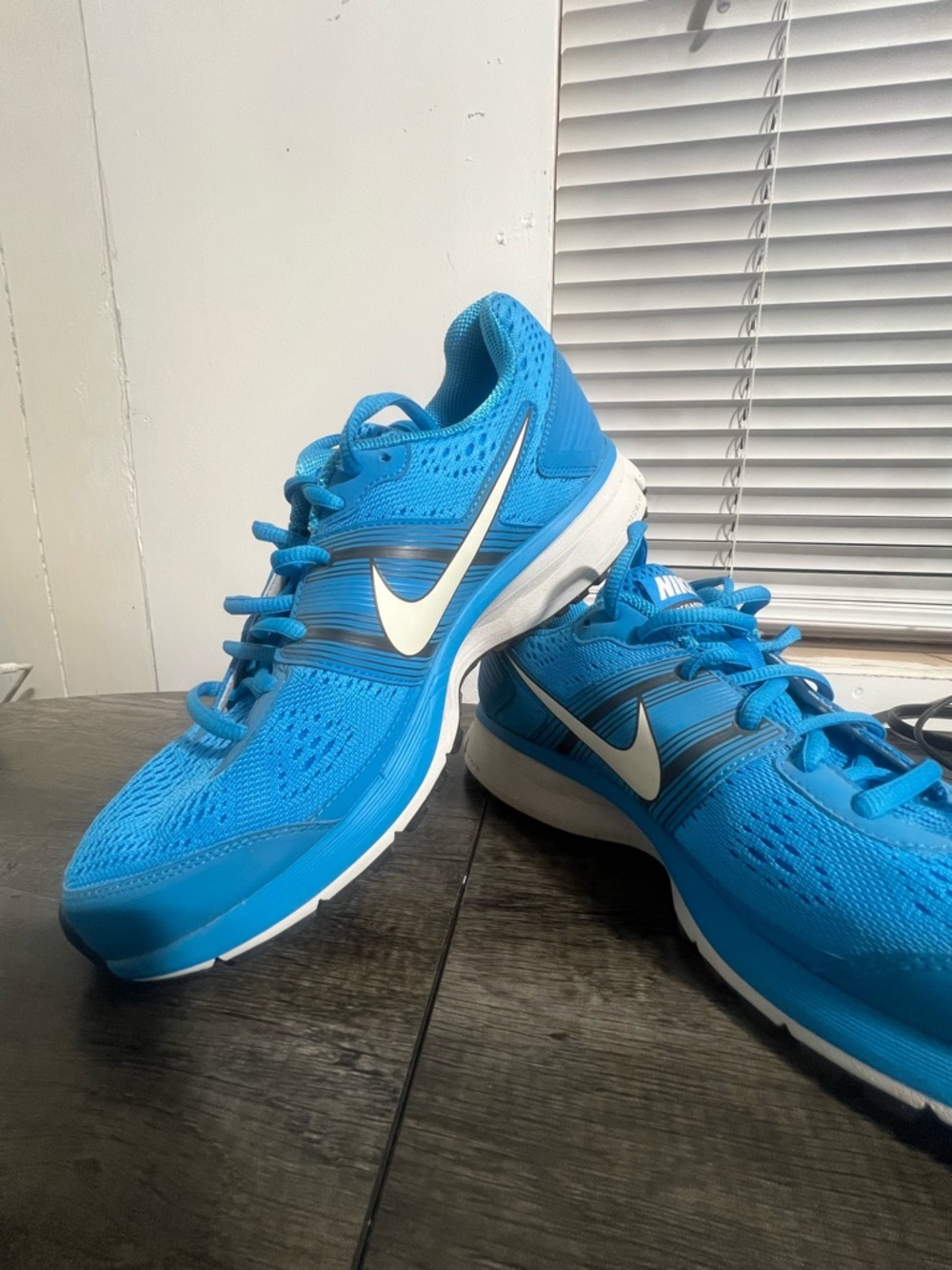 Woman’s Nike Bright Blue Athletic Trainers with White Swoosh
